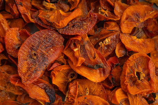 Dried persimmon in the form of an abstract background