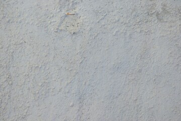 Old painted white cement wall background 