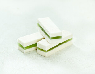 Apple pastille zephyr with marmalade on a light background