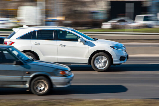 Ukraine, Kyiv - 3 March 2021: White Acura RDX car moving on the street;