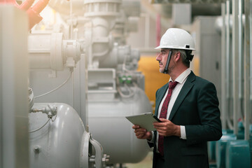 Portrait shot of senior engineer or management level inspection work in boiler room	
