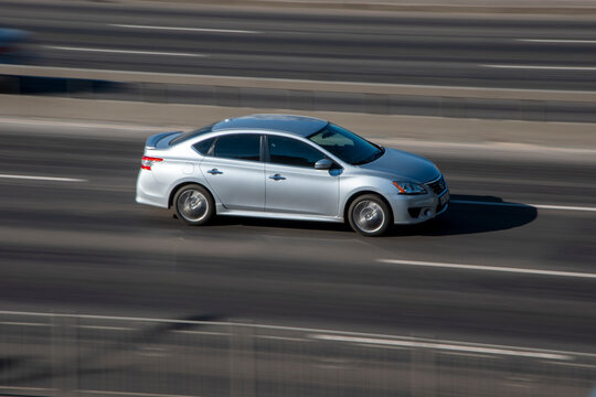Ukraine, Kyiv - 3 March 2021: Gray Nissan Sentra car moving on the street;