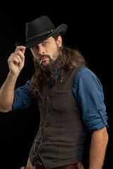 Cowboy with guns. Studio shooting