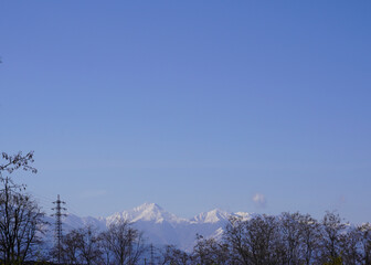 snowy mountains with blue sky in Nagano Japan