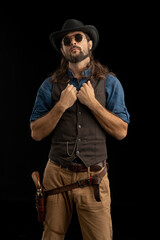 Cowboy with guns. Studio shooting