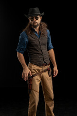 Cowboy with guns. Studio shooting