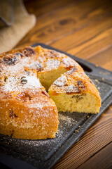 cooked sweet biscuit with dried apricots and nuts inside