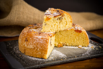 cooked sweet biscuit with dried apricots and nuts inside