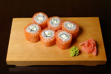 beaters Philadelphia with a salmon an avocado cucumber soft cheese on a board healthy healthy food