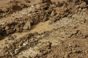 muddy clay autumn tractor road