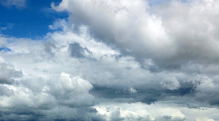 Obraz premium Dark blue ominous grey storm clouds. Dramatic
