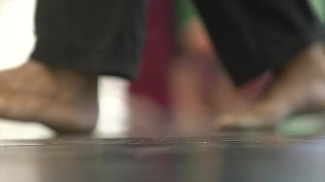 close-up of dancer feet stepping on the floor. low view 