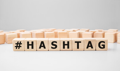 Word HASHTAG made with wood building blocks