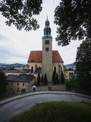 Wide angle panorama view of baroque historic old religious building Stadtpfarrkirche Muelln church...