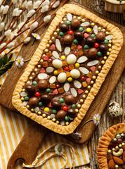 Traditional Easter cake in Poland called mazurek, top view. Delicious very sweet festive dessert - obrazy, fototapety, plakaty