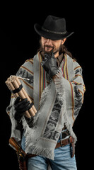 Cowboy with guns. Studio shooting