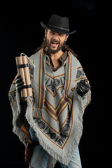 Cowboy with guns. Studio shooting