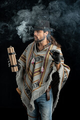 Fototapeta premium Cowboy with guns. Studio shooting