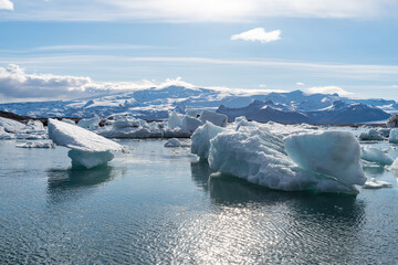 Icebergs in Jokulsarlon glacial lagoon on a beautiful sunny afternoon in famous Icelandic travel location © Gergo Csorba