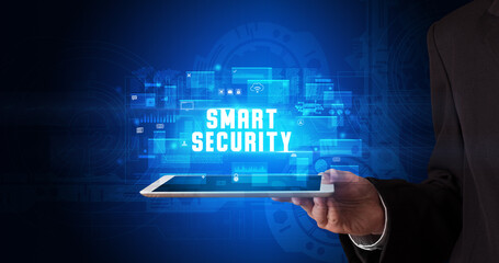 Person holding tablet, security concept