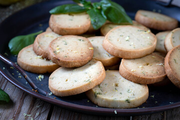 Shortbread cookies with lemon zest and basil