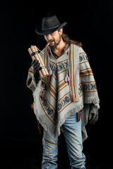 Cowboy with guns. Studio shooting