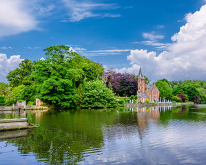 Fototapeta na wymiar Bruges (Brugge) cityscape with Minnewater lake