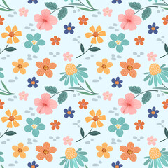 Colorful flowers, and leaves on a light blue background. Abstract floral seamless pattern design for backdrop, wrapping paper, fabric, textile, and wallpaper.