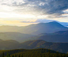 beautiful green mountain valley in blue mist at the sunset, beautiful travel background
