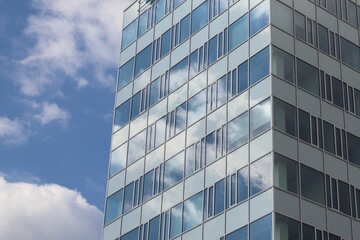 Sky and clouds reflection in the windows of the office building at Brno, Czech republic 