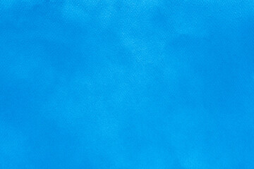 Abstract blue spray paint on paper texture background