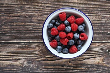 Fresh raspberry and blueberry. Flat layot, copy space