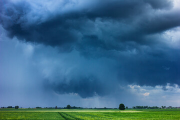 Fototapeta na wymiar Supercell storm clouds with hail and intence winds