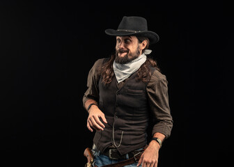 Obraz premium Cowboy with guns. Studio shooting