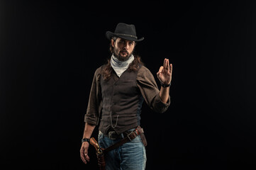 Cowboy with guns. Studio shooting