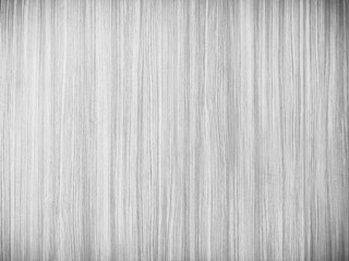 Obraz premium The softness of ply stripes plywood surface for background. Black and white background old plywood texture. Old plywood surface made into a black and white image. Vertical splinter display plywood.