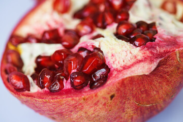 Close up pomegranate fruit cut with seeds