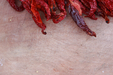 red hot chilies on the wooden table  for food background 