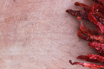 red hot chilies on the wooden table  for food background 