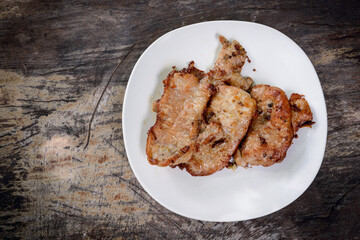 fried pork in white plate