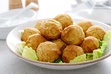 Falafel with greek yogurt sauce tzatziki, mediterranean cuisine