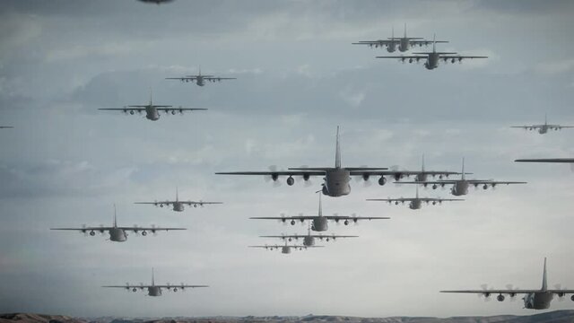 Formation of multiple military AC-130 gunship aeroplanes heading for a para drop behind enemy lines. Air force Infantry Airborne Para regiment air drop in dessert country for invasion. War on terror.