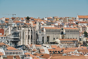 Fototapeta na wymiar LISBON, PORTUGAL - SEPTEMBER 20, 2019. Old Lisbon street on a beautiful summer day