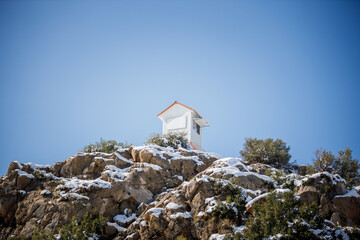 Shack in the mountains with snow