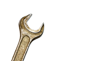 Old grungy wrench isolated on white background.