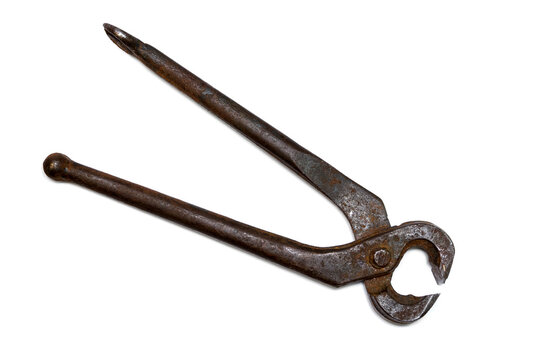 Old rusty pincer pliers isolated on white background.