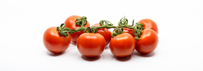 Bunch of Cherry Tomatoes Isolated on White Background.