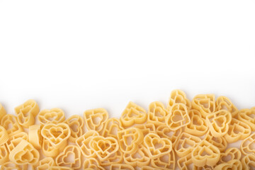 Raw Italian pasta fettuccine, amorini, paccheri, farfalle, spaghetti, fusilli, penne, conchiglie isolated on a white background. Top view