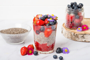 chia pudding with berries and flowers