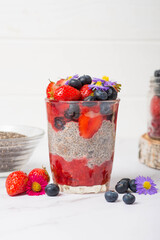 chia pudding with berries and flowers